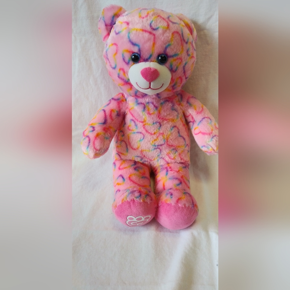 Build a Bear pink w/ multicolored hearts. 15 inches tall